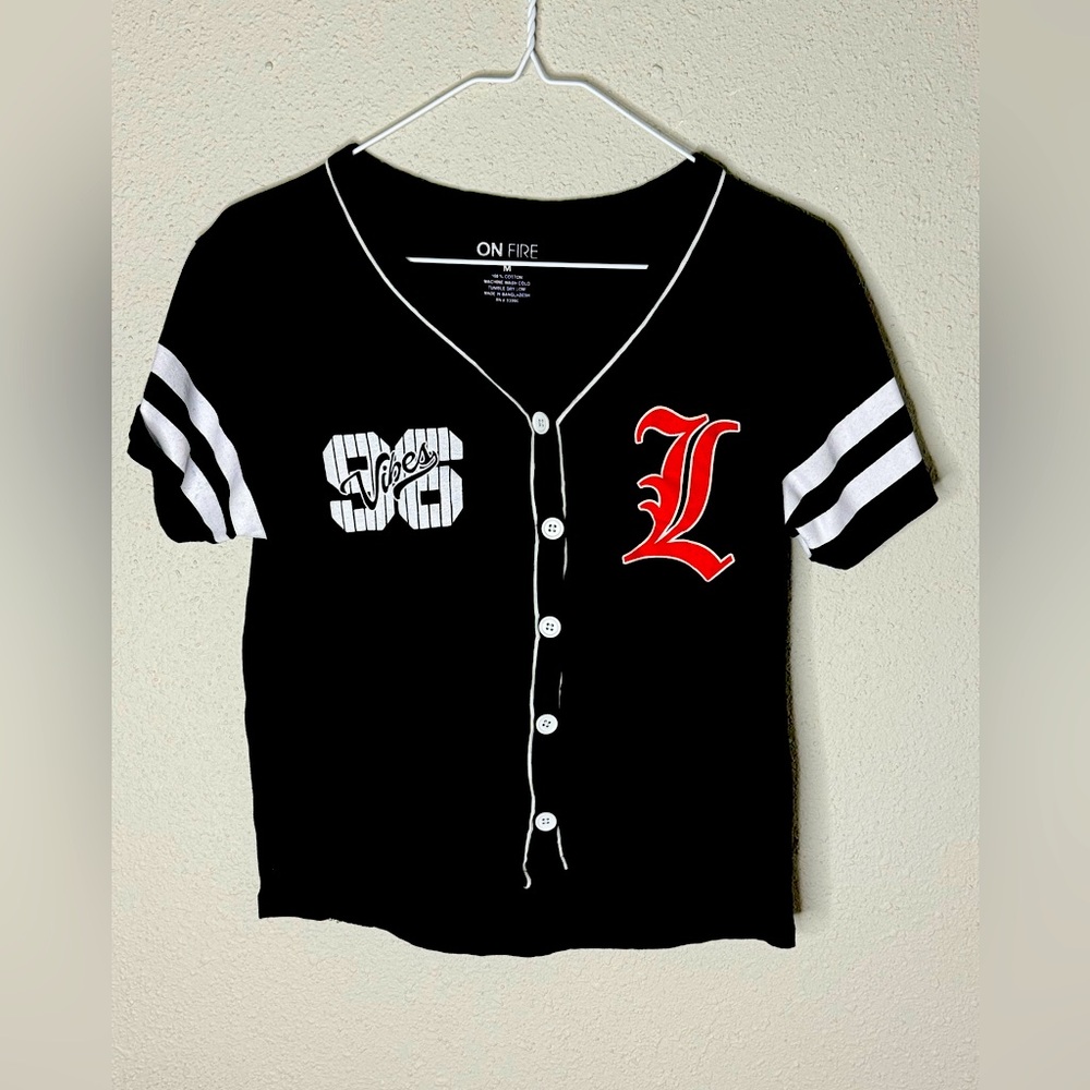 On fire, size medium, black shirt